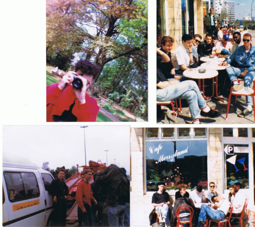 A group of people standing in front of a building

Description automatically generated