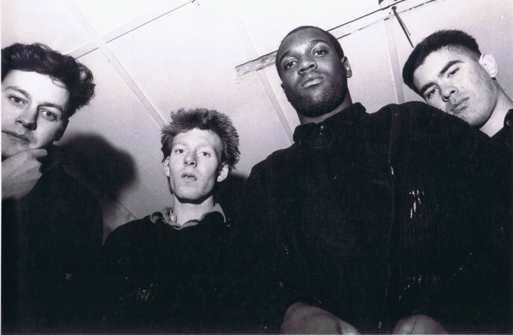 A group of people posing for the camera

Description automatically generated