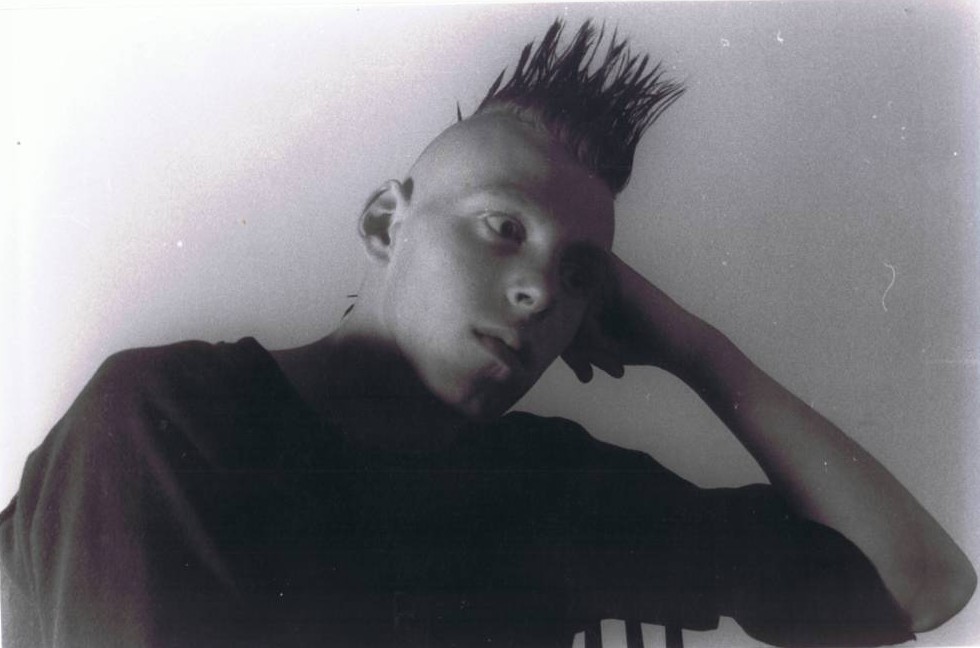 A person looking at the camera

Description automatically generated