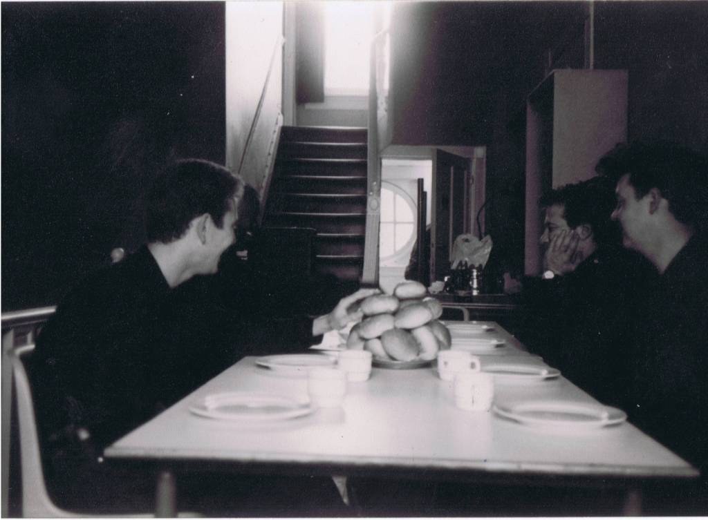 A group of people sitting at a table

Description automatically generated