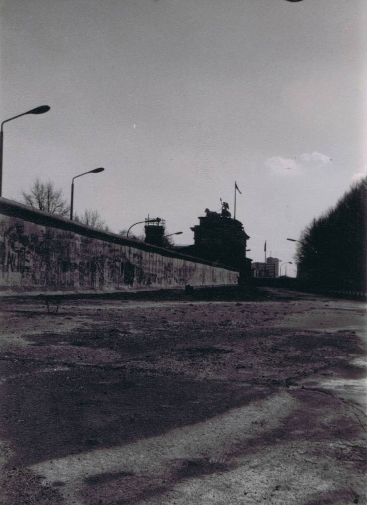 A picture containing outdoor, track, building, train

Description automatically generated