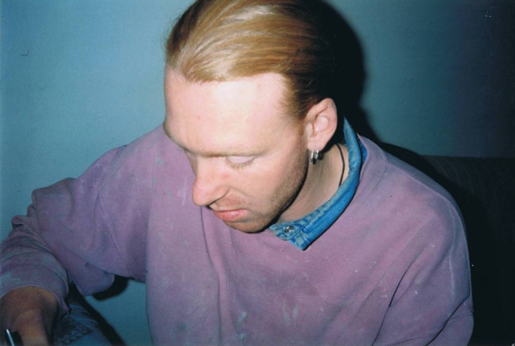 A person in a blue shirt

Description automatically generated